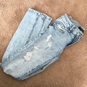 Distressed faded denim refuge jeans
